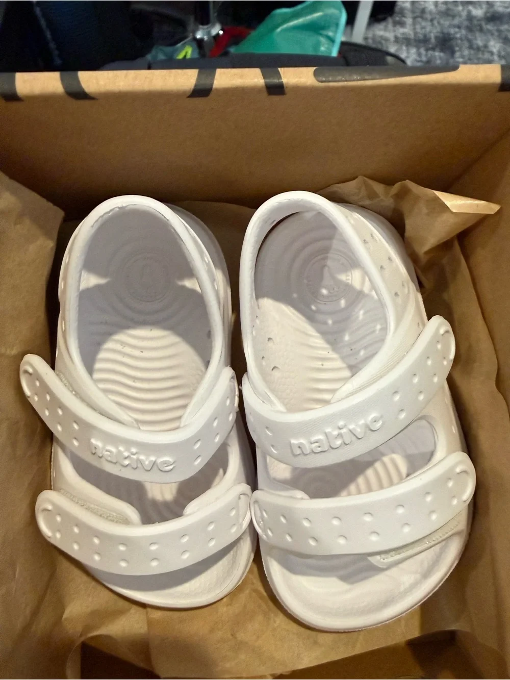 Native toddler sandals in Shell White